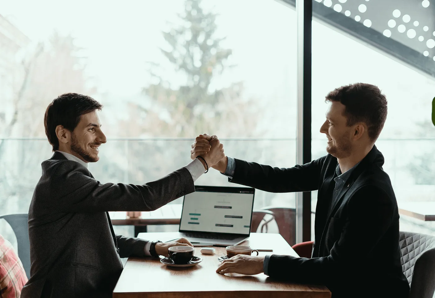 Property owner and manager shaking hands
